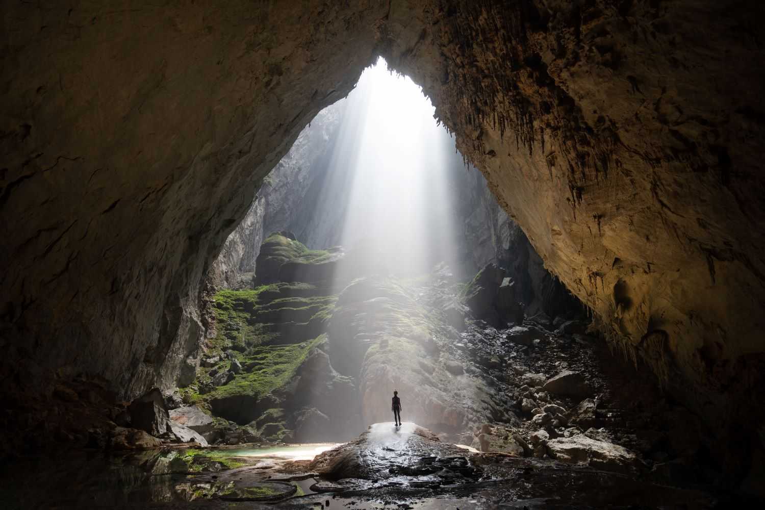 The majestic beauty of Son Doong Cave when light shines deep into the cave.