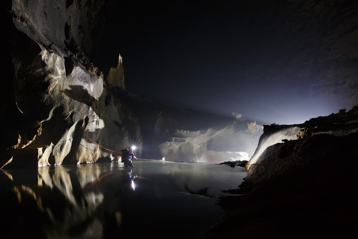 The route crosses multiple underground rivers, requiring experience and physical strength to ensure safety.